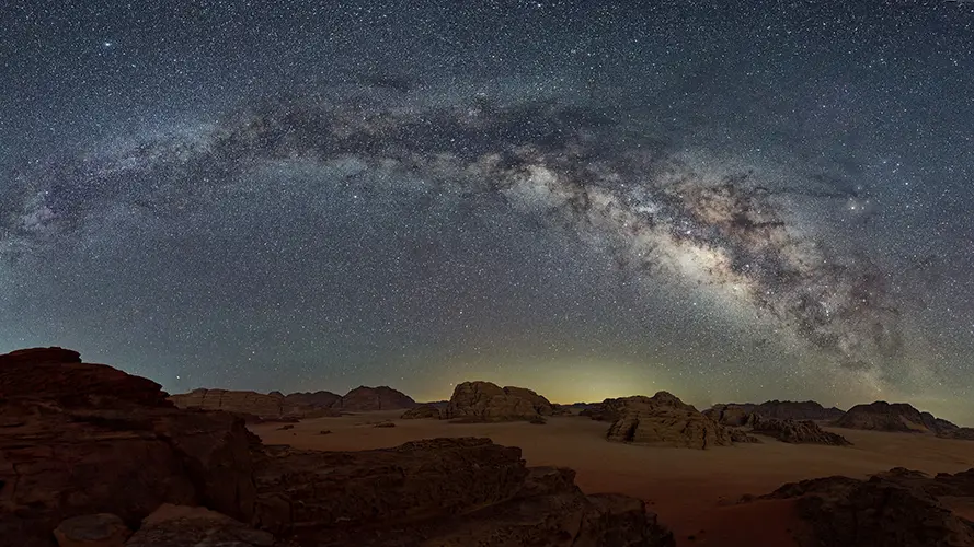 Starry night sky over the desert